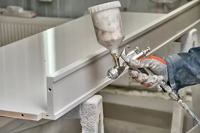 Industrial powder coating service applying protective coating to metal surfaces