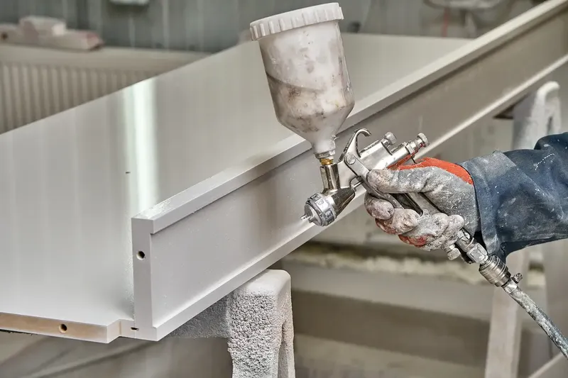 Industrial powder coating service applying protective coating to metal surfaces