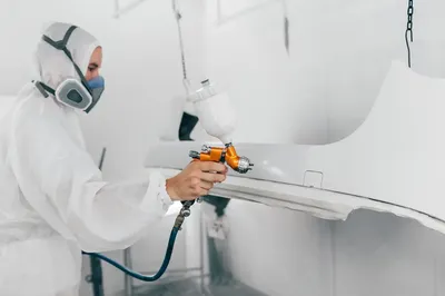 Steel coating process showing precision powder coating application