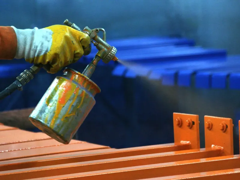 Professional powder coating service Melbourne applying protective finish to metal cabinet